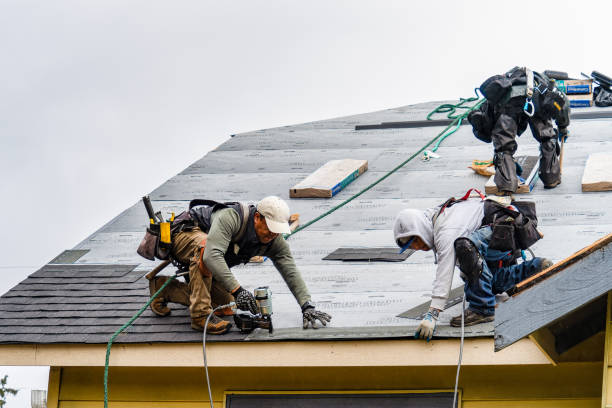 Professional Gutter Installation technician working in Toluca Lake, CA